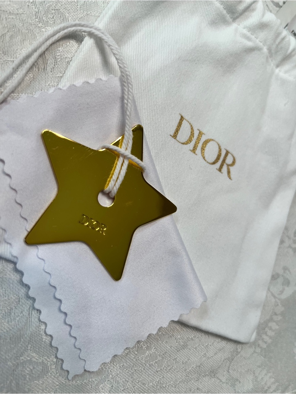 Dior Gold Star Charm, Dior Drawstring Pouch, Cleaning Cloth and Serum Sample - Picture 5 of 5